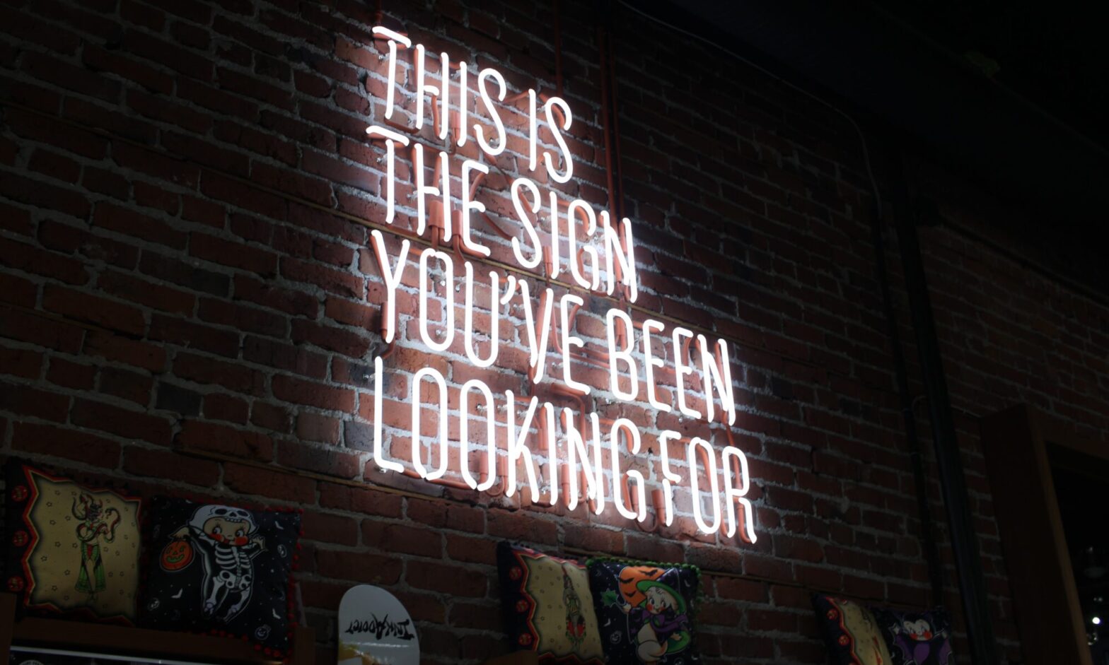 Sign showing "This is the sign you've been looking for" that you can apply for the Marketing Account Manager open position at Bright Pink Agency.